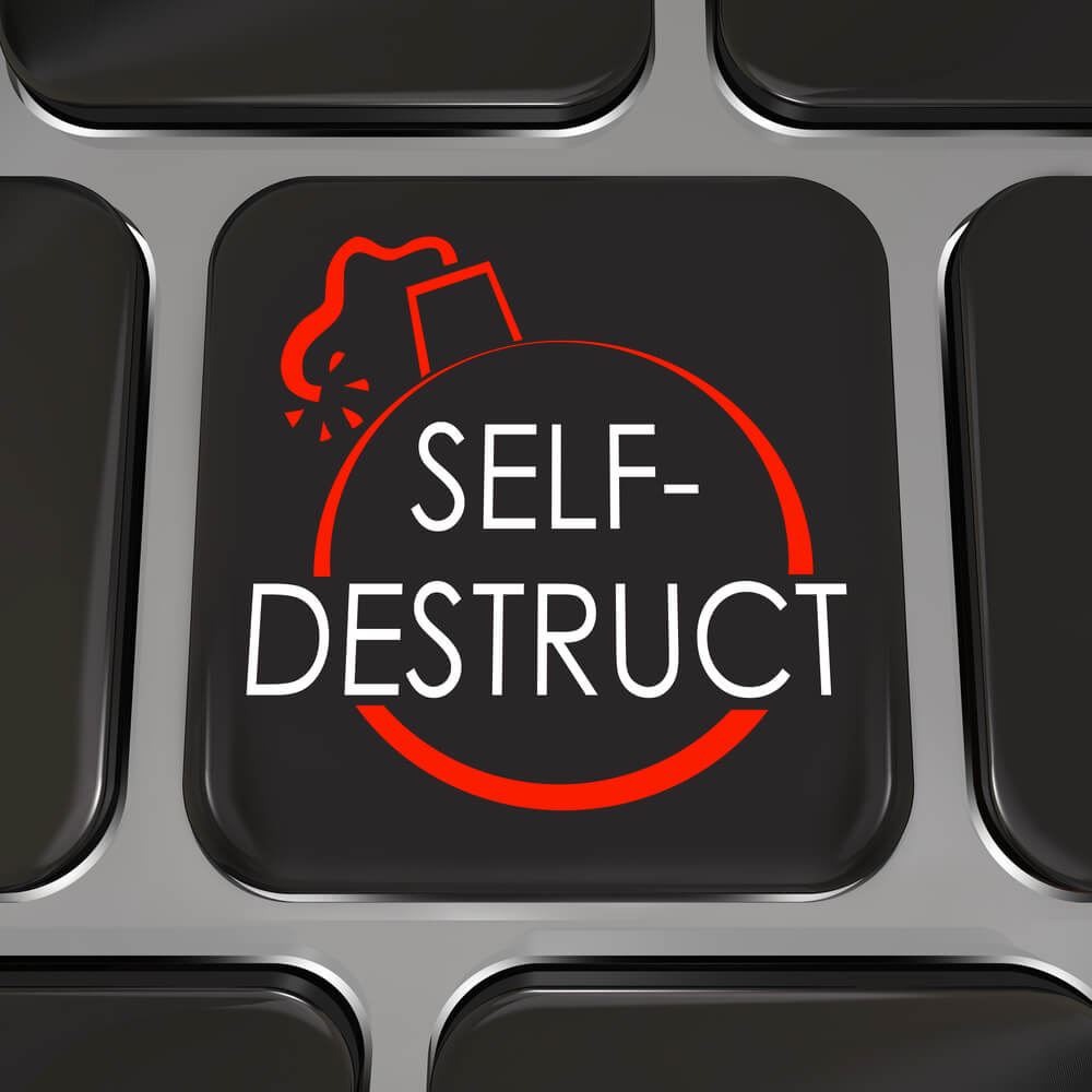 typewriter button with a picture of a bomb in it and the word self-destruct