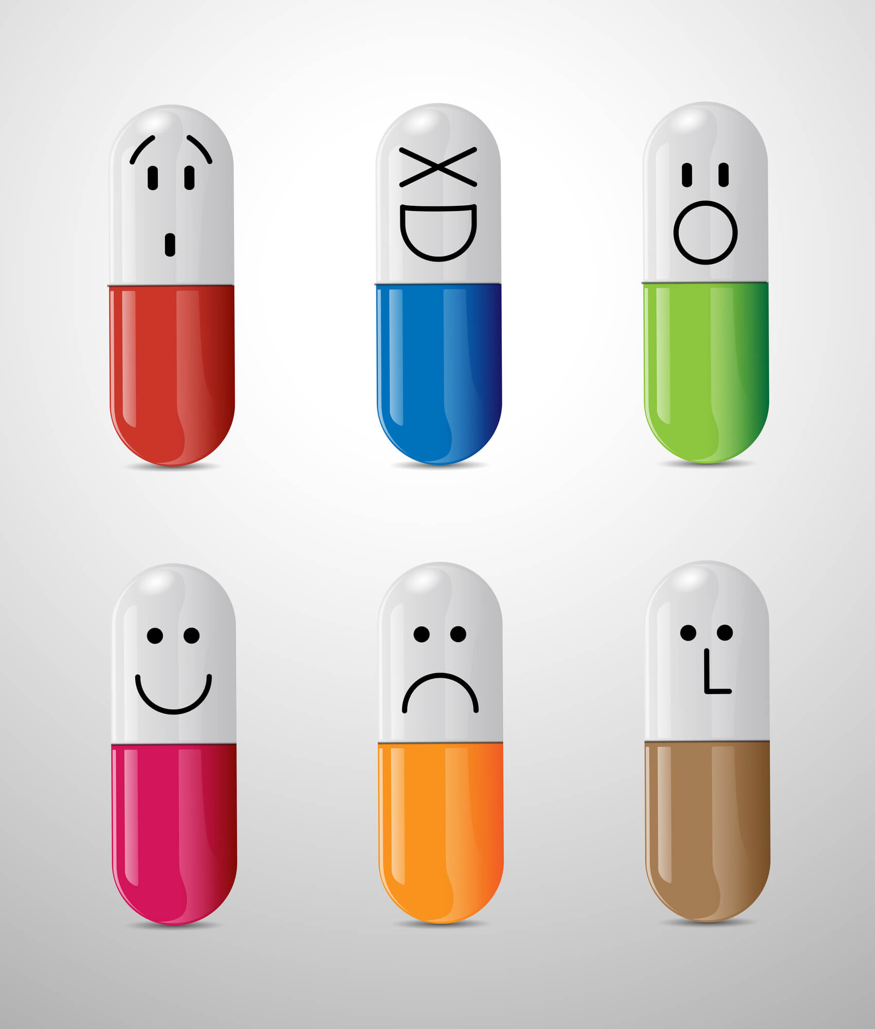 6 medication capsules with different faces